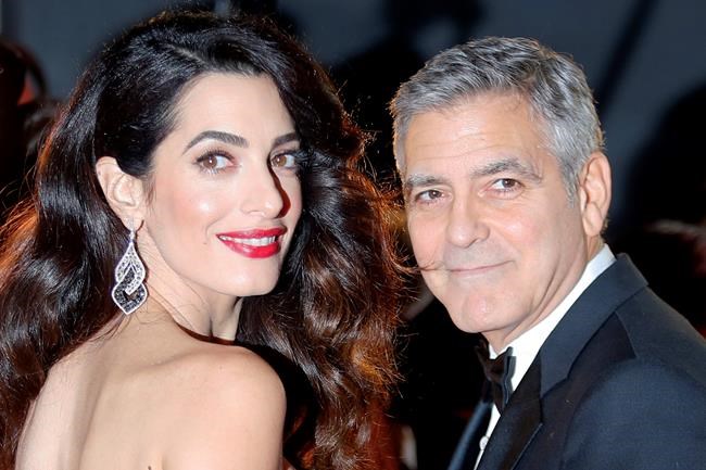 George Clooney threatens prosecution over pics of baby twins | iNFOnews.ca