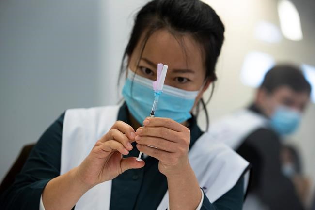 EU regulators OK increasing doses from virus vaccine vials | iNFOnews.ca