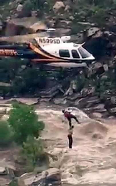 Rescuer clung to boy plucked from Arizona flash flood | iNFOnews.ca Rescuer clung to boy plucked from Arizona flash flood | iNFOnews.ca