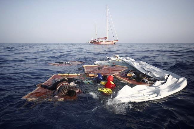 Survivor, 2 bodies from migrant boat wreck arrive in Spain | iNFOnews.ca CP302019647