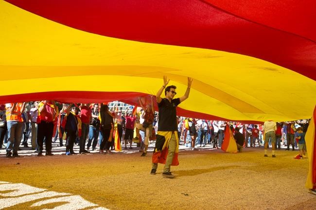 The Latest: Spain minister warns of Catalan business exodus | iNFOnews.ca CP1984964685