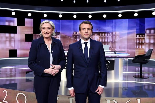 Le Pen and Macron clash in no holds-barred debate in France | iNFOnews.ca