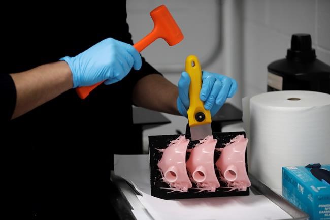 Volunteers use 3D printers to make personal protective equipment during pandemic | iNFOnews.ca