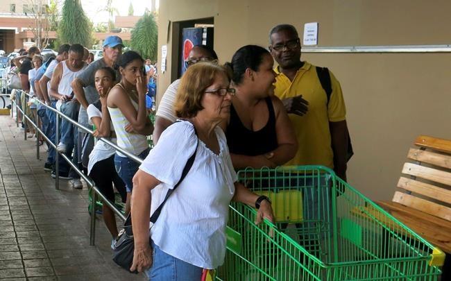 Puerto Rico emerges from storm; water and some food scarce | iNFOnews.ca Puerto Rico emerges from storm; water and some food scarce | iNFOnews.ca