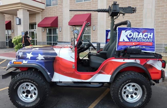 After balking, Kansas parade won't bar Kobach's replica gun | iNFOnews.ca After balking, Kansas parade won't bar Kobach's replica gun | iNFOnews.ca