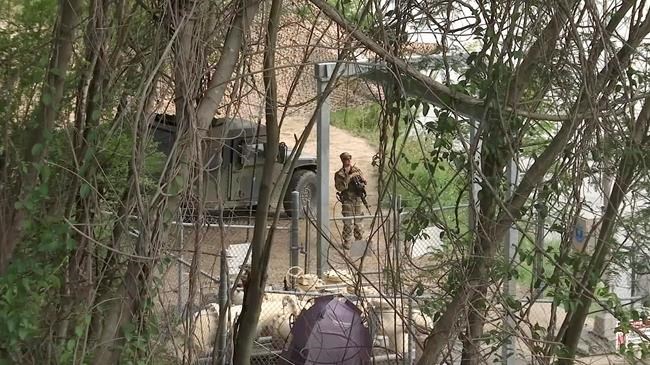 The Latest: Texas governor says half of 1,400 troops on job | iNFOnews.ca