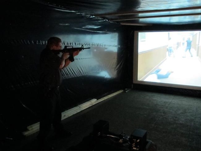 In shooting simulator, fairgoers aim from police perspective | iNFOnews.ca