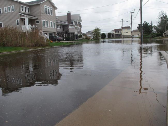 Amid rising seas, 'dry' resort is wetter than it likes | iNFOnews.ca Amid rising seas, 'dry' resort is wetter than it likes | iNFOnews.ca