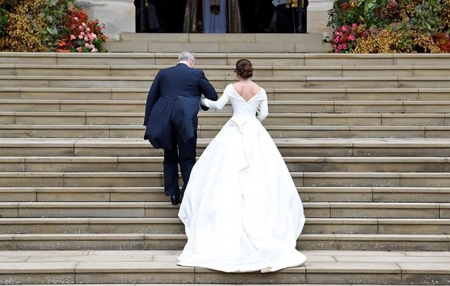 The Latest: British designers made Eugenie's wedding dress | iNFOnews.ca