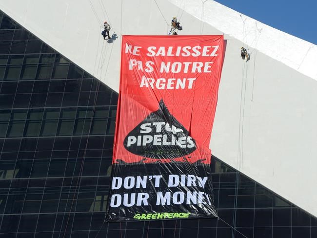 Greenpeace members arrested for climbing Olympic Stadium tower in Montreal | iNFOnews.ca