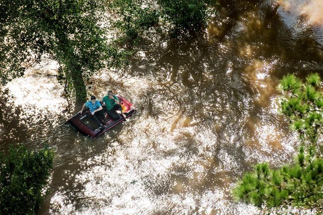 S. Carolina gov spots men on flooded road, summons rescue | iNFOnews.ca