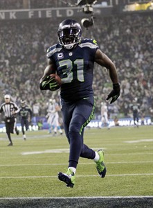 Wilson throws 3 TDs, Chancellor INT return provides capper as Seattle beats Carolina 31-17 | iNFOnews.ca