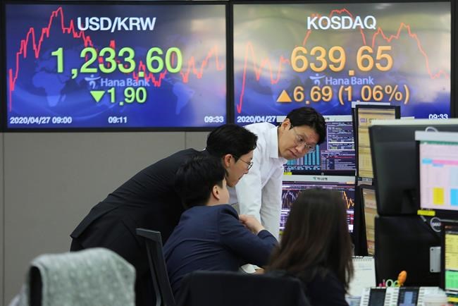 Asian markets gain after Japan central bank boosts aid | iNFOnews.ca Asian markets gain after Japan central bank boosts aid | iNFOnews.ca
