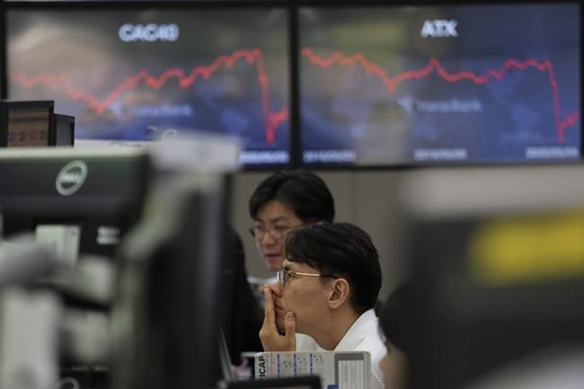 Asian stocks mixed after Wall Street gains on recovery hopes | iNFOnews.ca Asian stocks mixed after Wall Street gains on recovery hopes | iNFOnews.ca
