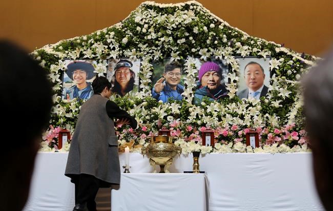 Weeping relatives receive bodies of South Korean climbers | iNFOnews.ca Weeping relatives receive bodies of South Korean climbers | iNFOnews.ca