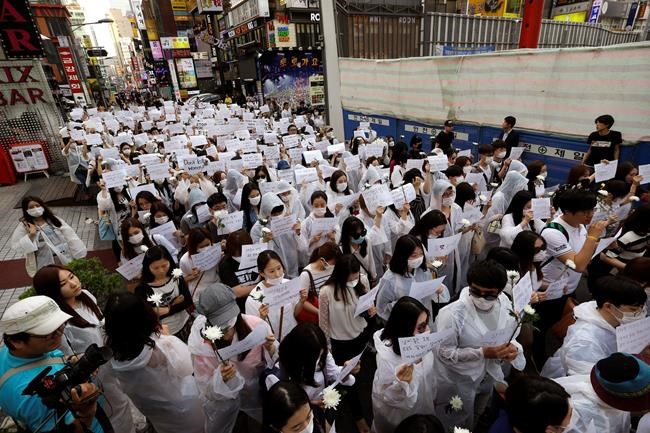 South Koreans march to protest woman's stabbing death | iNFOnews.ca CP1116668957
