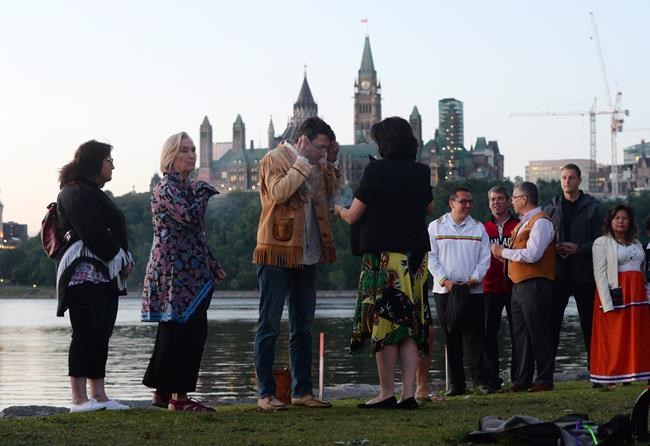PM marks Aboriginal Day with sunrise ritual, father's buckskin and a canoe ride | iNFOnews.ca