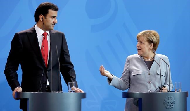 Qatari emir meets Merkel, Macron in 1st trip since crisis | iNFOnews.ca