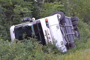 Woman dies after tour bus crashes into ditch on Cabot Trail in Cape Breton | iNFOnews.ca CP29131241