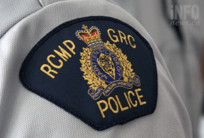 An RCMP badge on a shirt.