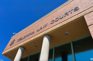 A blue sky behind the Kelowna courthouse.