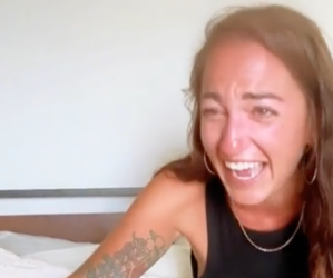 A lady crying laughing.