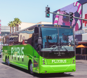 A Flixbus coach drives along the road.