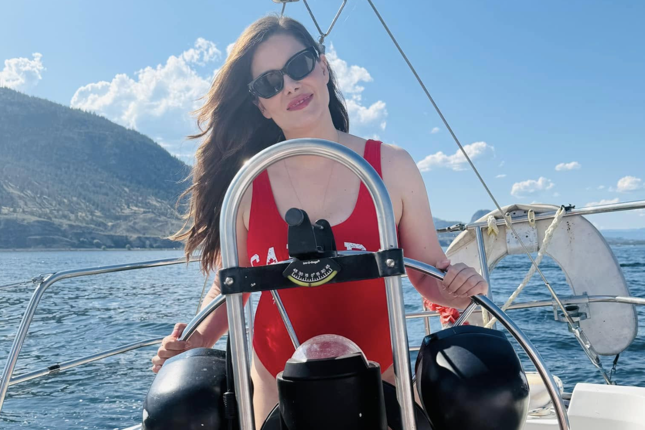 Penticton-Summerland MLA leaves BC Conservatives to end action-packed rookie year | iNFOnews.ca Amelia Boultbee driving a boat on the lake.