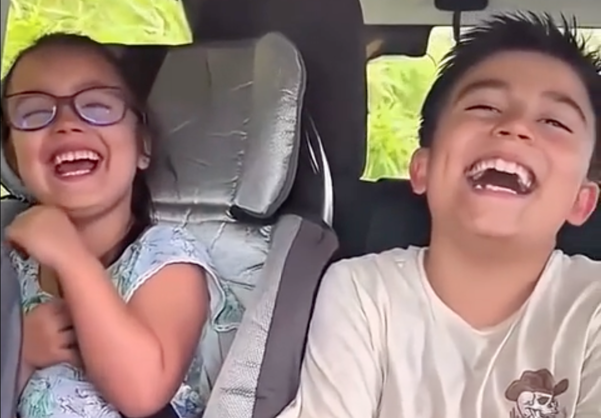 Two kids laughing