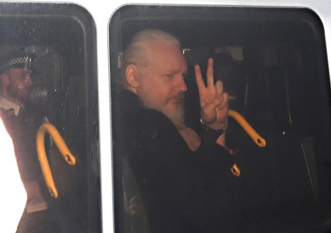 WikiLeaks' Assange hauled from embassy, faces US charge | iNFOnews.ca