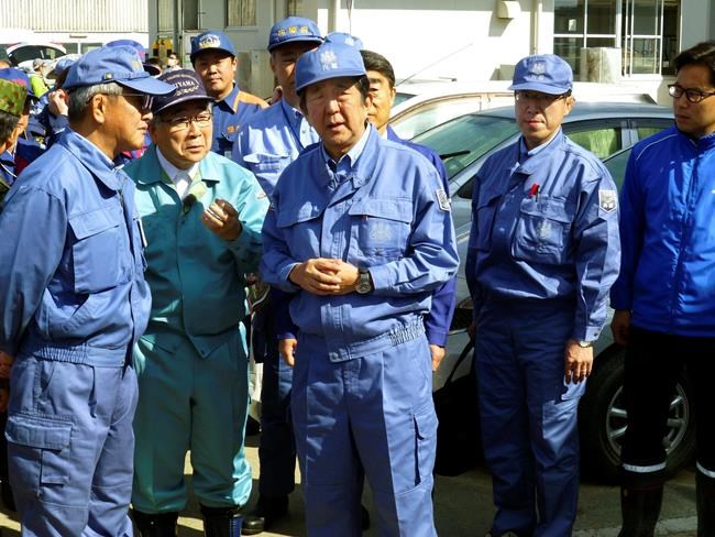 Japan PM visits storm-hit areas; royal parade may be delayed | iNFOnews.ca