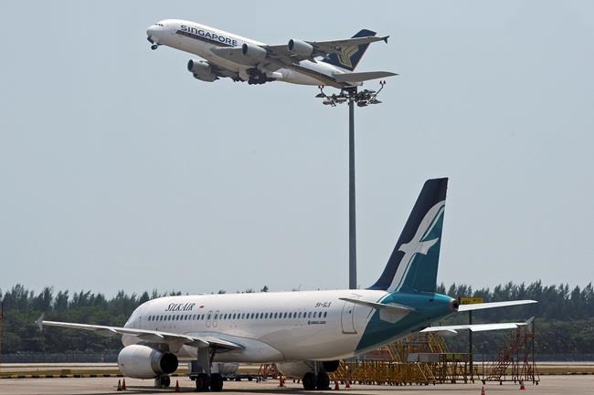 Singapore probes drones at airport that disrupted 63 flights | iNFOnews.ca