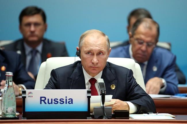Putin says Trump 'not my bride, and I'm not his groom' | iNFOnews.ca