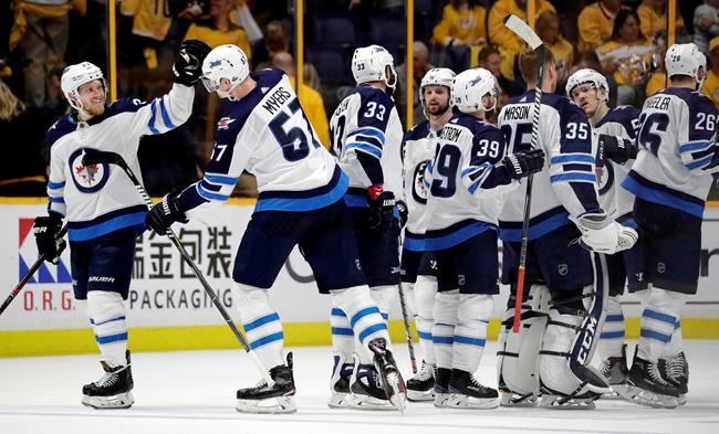 Hellebuyck has 47 saves as Jets top Predators 4-1 in Game 1 of 2nd-round series | iNFOnews.ca