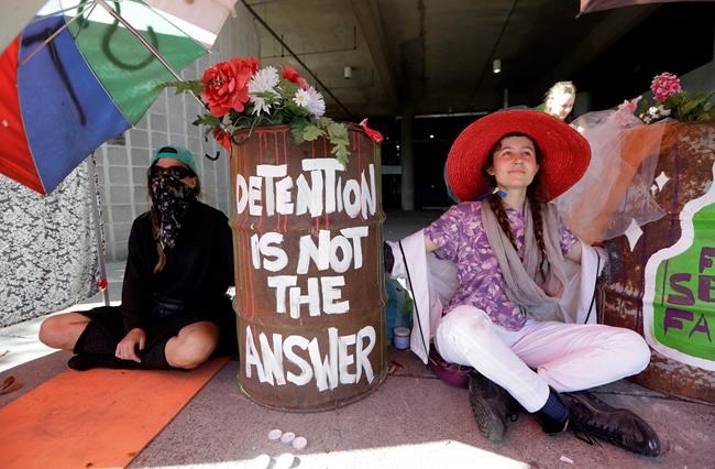 19 arrested at protest blocking private prison headquarters | iNFOnews.ca