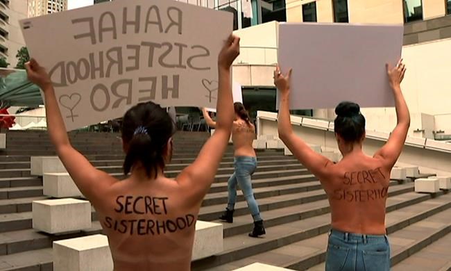 Australians hold topless protest in support of Saudi runaway | iNFOnews.ca Australians hold topless protest in support of Saudi runaway | iNFOnews.ca