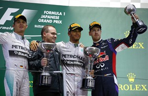 Lewis Hamilton beats teammate Nico Rosberg to win Japanese GP marred by Bianchi crash | iNFOnews.ca CP30166174