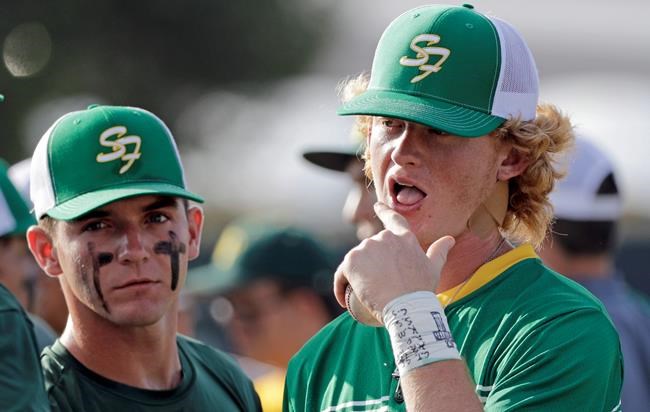 The Latest: Wounded student attends school baseball game | iNFOnews.ca