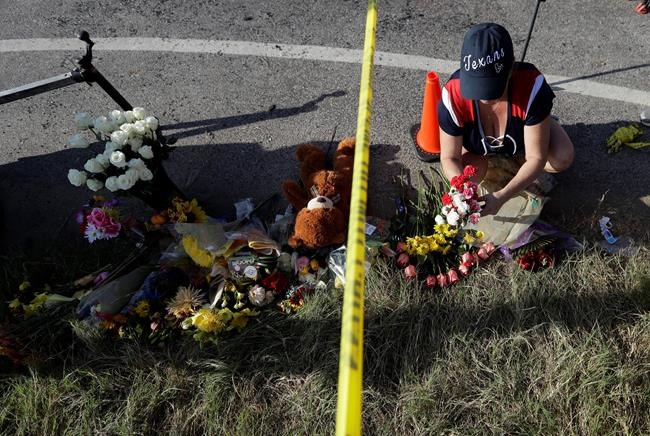 The Latest: 2 men who pursued gunman attend shooting vigil | iNFOnews.ca
