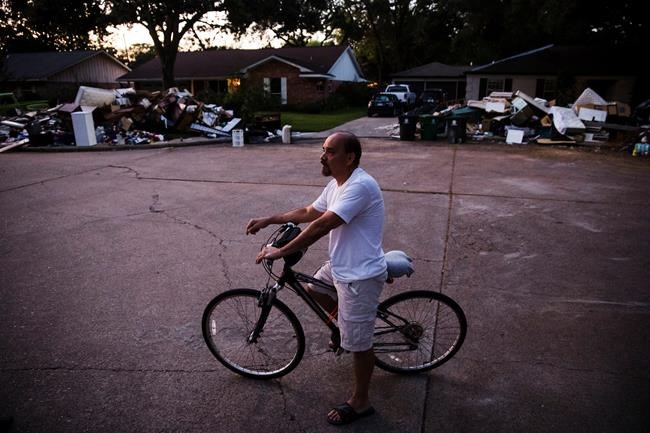Harvey's floodwaters give way to festering piles of garbage | iNFOnews.ca Harvey's floodwaters give way to festering piles of garbage | iNFOnews.ca