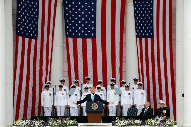 On 'sacred soil,' Trump lauds those who've fallen in service | iNFOnews.ca CP1133834683