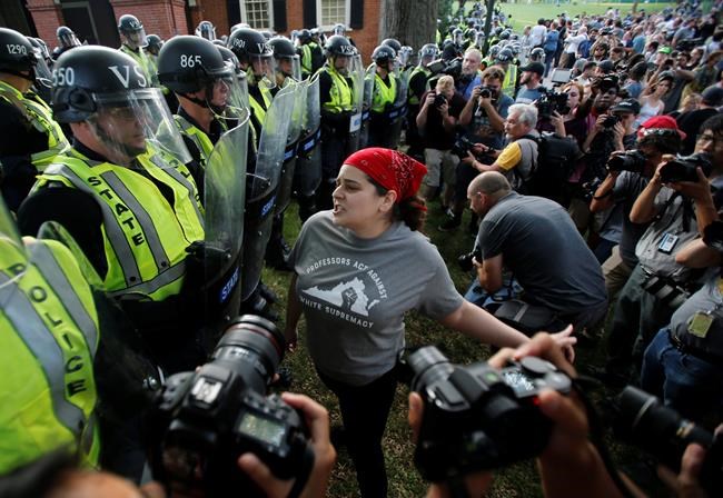 Tense confrontation amid peaceful vigils in Charlottesville | iNFOnews.ca