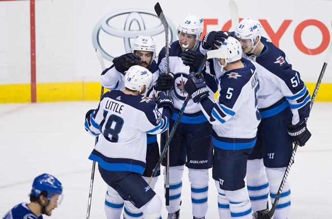 Laine, Myers score three minutes apart to lead Jets over Canucks 4-2 | iNFOnews.ca CP1135160927