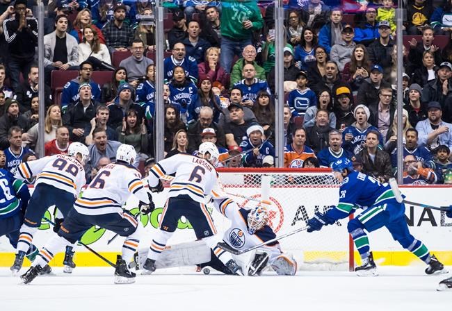 Trio of power-play goals lifts Canucks to 4-2 victory over Oilers | iNFOnews.ca Trio of power-play goals lifts Canucks to 4-2 victory over Oilers | iNFOnews.ca