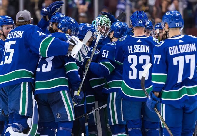 Goaltender Thatcher Demko keeps smiling in nail-biting NHL debut, Canucks win | iNFOnews.ca Goaltender Thatcher Demko keeps smiling in nail-biting NHL debut, Canucks win | iNFOnews.ca