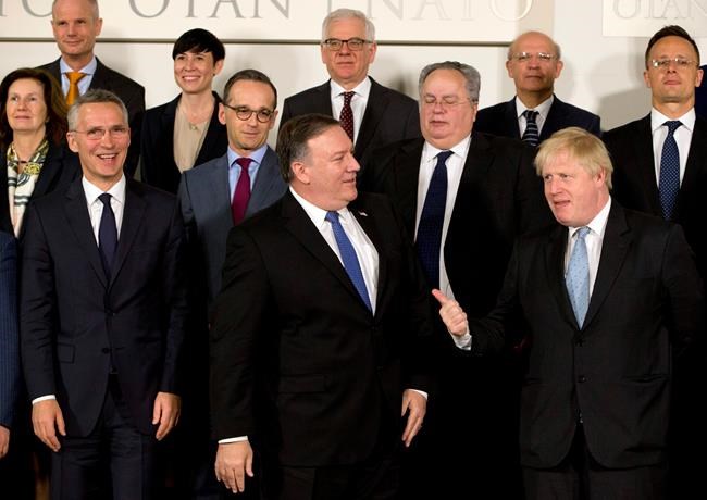 NATO backs Afghan leader's offer of talks with the Taliban | iNFOnews.ca