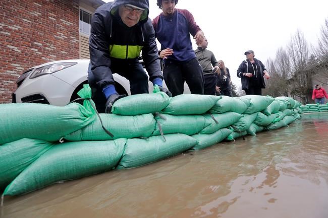 Rescues by chopper, front loader as flood hits northwest US | iNFOnews.ca Rescues by chopper, front loader as flood hits northwest US | iNFOnews.ca