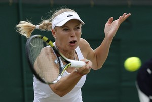 Halep, Wozniacki advance at Wimbledon on day of contrasting weather | iNFOnews.ca CP28928533