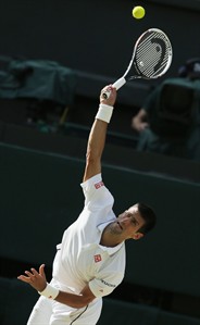 Denying Federer a record 8th Wimbledon title, Djokovic holds on in 5 sets to claim his 2nd | iNFOnews.ca Denying Federer a record 8th Wimbledon title, Djokovic holds on in 5 sets to claim his 2nd | iNFOnews.ca