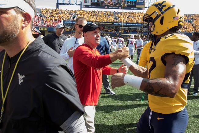 Kendall throws 3 TDs, West Virginia beats NC State 44-27 | iNFOnews.ca CP2011794800